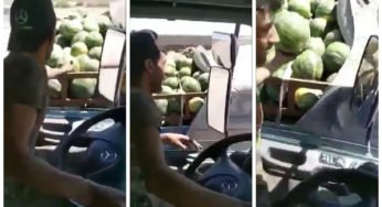 Caminhoneiro é flagrado pegando melancia em outra carreta em movimento