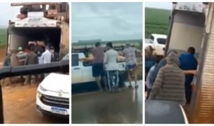 Após caminhão tombar seguradora autoriza populares a levar a carga