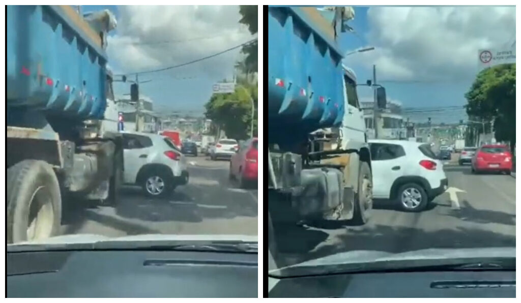 Carro entra em ponto cego de caminhão e é arrastado