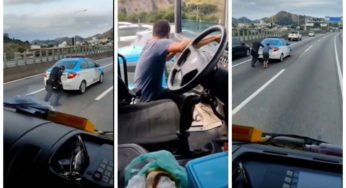 Caminhoneiro desce do caminhão para ajudar policial e empurra viatura da Polícia Militar