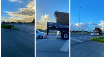 Encostou ou não? Veículo pegou carona na traseira de caminhão?