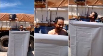 Cansado de pagar para tomar banho, caminhoneiro improvisa seu própio banheiro