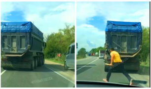 Motorista desce com taco de beisebol após levar fechada de caminhoneiro