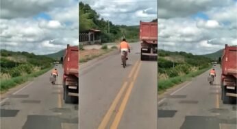 Ciclista imprudente coloca sua vida em risco ao realizar ultrapassagem em caminhão