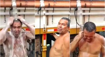 Caminhoneiro improvisa chuveiro no caminhão para tomar banho