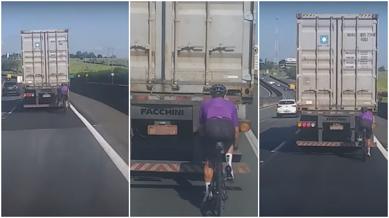 Ciclista pegando rabeira em caminhão