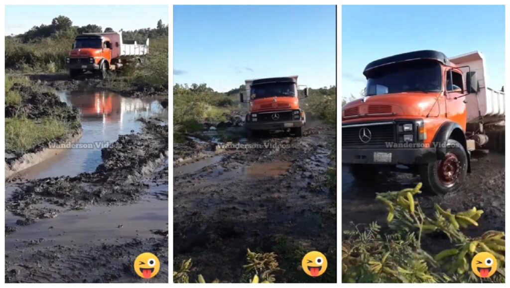 Caminhoneiro mostrar que é bom de braço ao passar em lamaçal