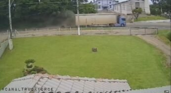 Câmera de segurança registra carreta perdendo eixo após passar em lombada