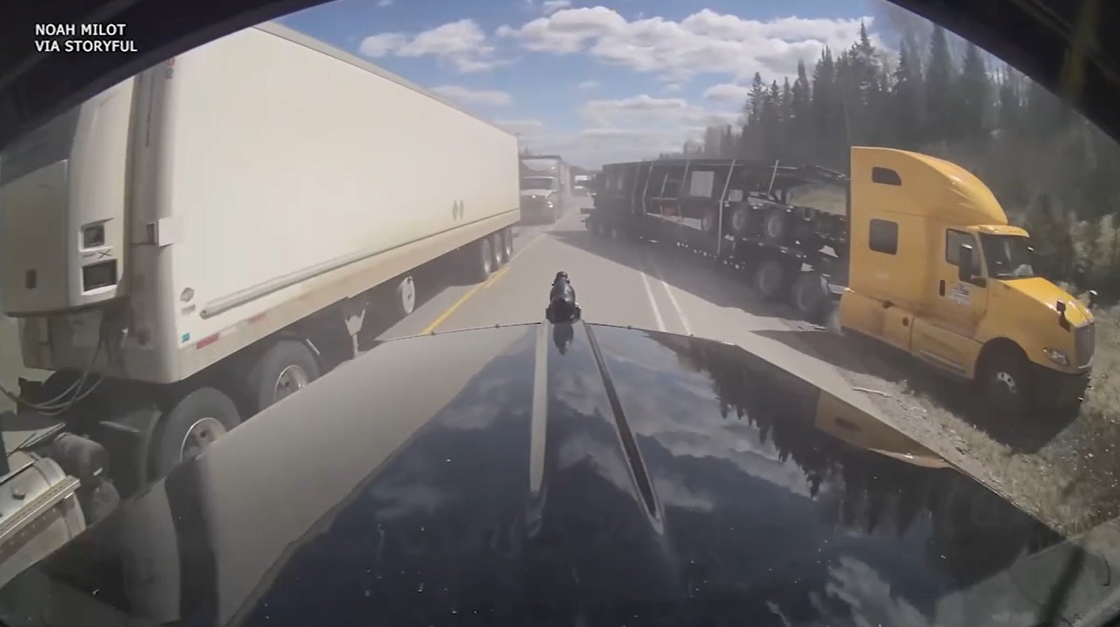 Caminhoneiro canadense evita acidente impressionante