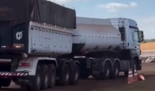 Cavalo mecânico é flagrado tracionando carreta tanque e caçamba ao mesmo tempo