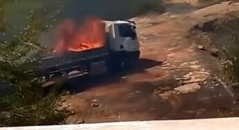 Caminhoneiro tenta jogar veículo no rio para acabar com incêndio