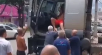 Caminhoneiro embriagado é retirado à força por populares após causar destruição