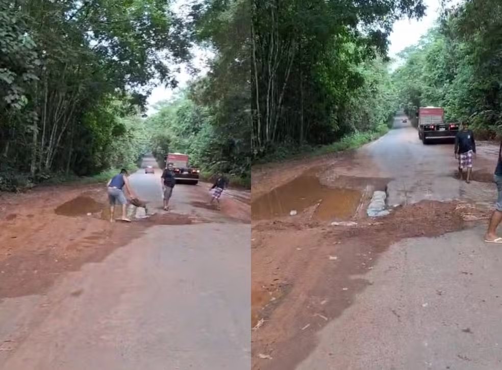 Caminhoneiro arrumando buraco