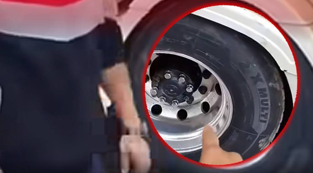 Borracheiro e caminhoneiros discutem.