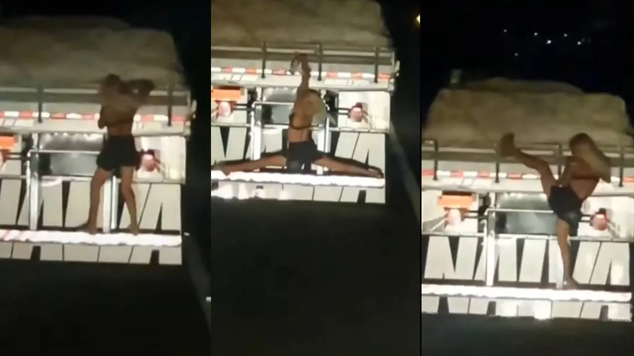 Mulher pega rabeira em caminhão e faz brincadeiras com caminhão em movimento