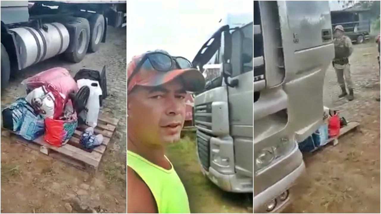 Caminhoneiro é expulso de caminhão com ajuda de polícias.