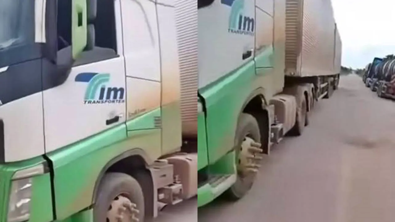 Caminhão da tim transportes parado na br